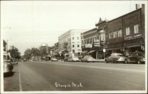 Sturgis MI Street Scene Stores Cars Real Photo Postcard