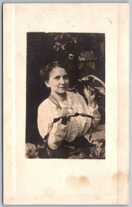 c1910 RPPC Real Photo Postcard Young Woman Outside Tropical Leaves