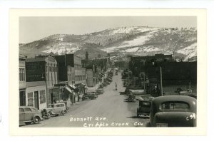 CO - Cripple Creek. Bennett Ave Street Scene, Shell Gas Station ca 1938 RPPC