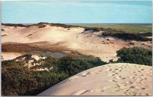 Footprints on Cape Cod sand dunes