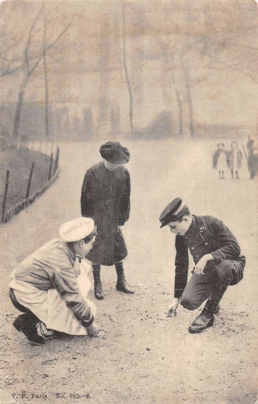 Paris France Children Playing Marbles  in Park Vintage Postcard AA54209 