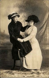 Gay Lesbian Interest Women in Studio Fur & Hats Holding Hands Gazing RPPC