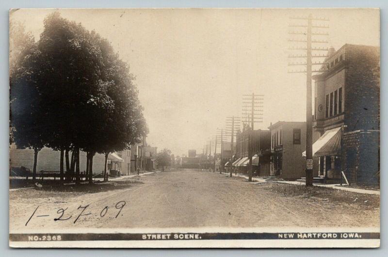 New Hartford Iowa~Main Street~Palace~Railroad Crossing~Elevator~1909 RPPC 