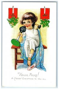 c1910's Christmas Little Girl Telephone Holly Berries Candles Embossed Postcard