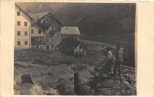 1910s RPPC Real Photo Postcard Alpine Scene Houses Men Rocks Snow