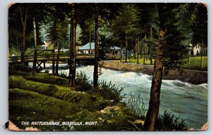 Missoula Montana~The Rattlesnake River & Bridge Scene~Postmarked~Vtg Postcard