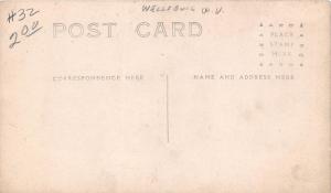 B41/ Wellsburg West Virginia WV RPPC Postcard Family Home Smile