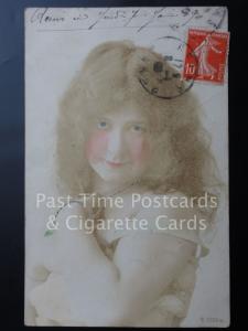 c1909 RPPC: Blushing young lady with peering blue eyes