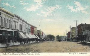 Stanton Michigan~Main Street East~Awnings on Storefront~Wide Dirt Road~1914 PC