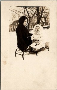 RPPC Posing with Baby on Sled in Snow Real Photo c1908 Postcard U1