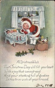 Christmas Little Boy as Santa Brings Toys to Doll in Bed c1910 Postcard