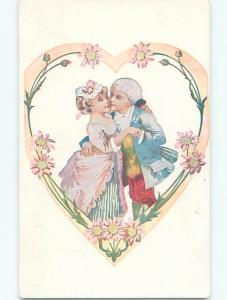 Unused Pre-1907 valentine COLONIAL ERA COUPLE INSIDE HEART WITH FLOWERS k9144