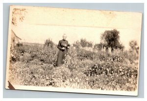 Vintage 1900's RPPC Postcard Portrait Woman in Flower Fields