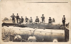 J4/ Interesting RPPC Postcard c1910 Train Railroad Disaster Locomotive Men 94