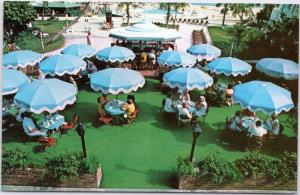 The Lago Mar, Fort Lauderdale, Florida People dining under umbrellas