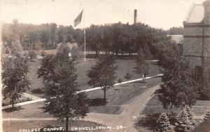 Grinnell Iowa College Campus~Couple on Walkway~Large American Flag~c1930 RPPC