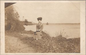 RPPC Pretty Woman Large Hat Beautiful Coat  Riverbank Long Pier Postcard X8