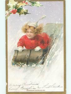 Pre-1907 christmas CUTE GIRL RIDES TOBOGGAN SLED W7363