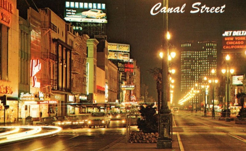 VINTAGE POSTCARD NIGHTTIME STREET SCENE CANAL STREET NEW ORLEANS LOUISIANA