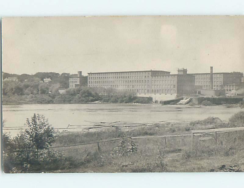 Pre-1907 rppc LARGE FACTORY BUILDING WITH SMOKESTACK ON THE RIVER HM0418