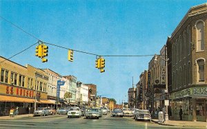 Monroe, MI Michigan FRONT STREET SCENE Kirby's Shoes~Drug Store ca1960s Postcard