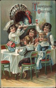 Thanksgiving Little Boy Chef Serves Turkey to Children c1910 Postcard