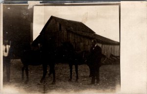 RPPC Men Showing off Horses at Barn Postcard Z22