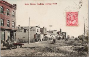 Hartney Manitoba Main Street looking West c1909 Phillips & Wrinch Postcard E97