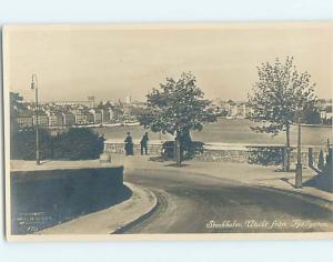 old rppc ROAD WITH BUILDINGS IN DISTANCE Stockholm Sweden HM1707