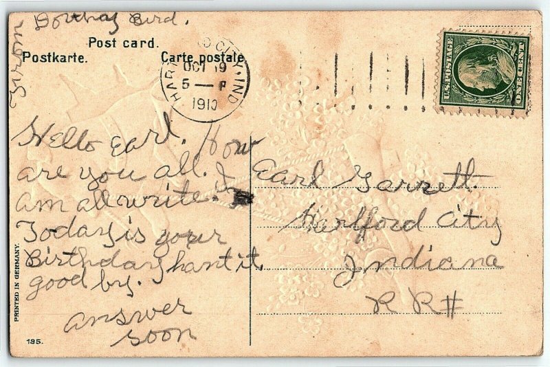 1910 Dog Holding Shoe With Flowers Birthday Greetings Postcard  