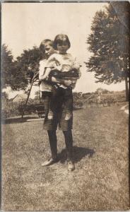 Person Holding Girl Child St. Thomas Ontario ON c1911 Real Photo Postcard D90