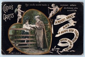 c1910's Christmas New Year Cupids Dart Couple Fence Big Heart Antique Postcard