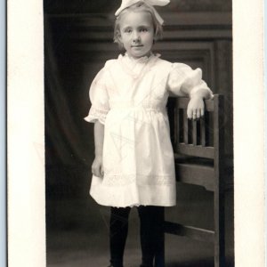 c1910s Cute Little Girl Smirk RPPC White Hair Bow Young Lady Real Photo Vtg A192