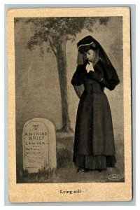 Vintage 1910's Humor Postcard Woman Looking over Grave Lying Still - Funny