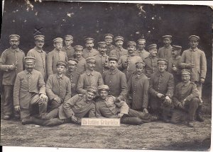 RPPC WWI Germany, Soldiers w Pipes, Group Portrait 1917 The Jolly Green Tunics