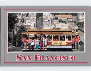 Postcard People Riding the Cable Car San Francisco California USA