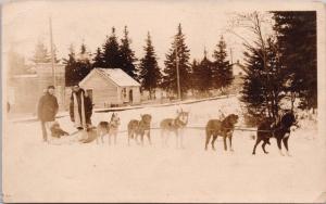 Men Child Dog Sled Dogs Winter Snow Unknown Location RPPC Postcard E35 *As Is