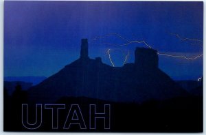 Postcard - Lighting appears to strike at Castle Rock - Southeastern Utah