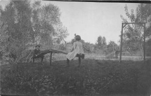 H75/ Interesting Real Photo RPPC Postcard c1910 Children See-Saw Playground 47