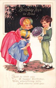 Lot350 birthday  children boy and girl with flower  greetings uk