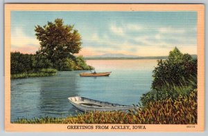 GREETINGS FROM ACKLEY IOWA BOATS ON LAKE SCENE TICHNOR VINTAGE LINEN POSTCARD