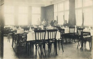 Social history restaurant interior & waiters vintage real photo postcard