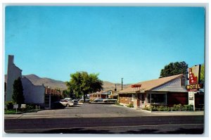 1966 Idaho Motel Exterior Roadside Pocatello Idaho ID Posted Signage Postcard