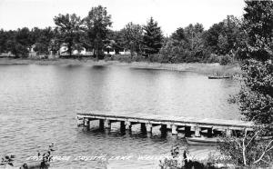 Wellston Michigan~Crystal Lake-East Shore~Houses behind Trees~Boat Dock~'60 RPPC