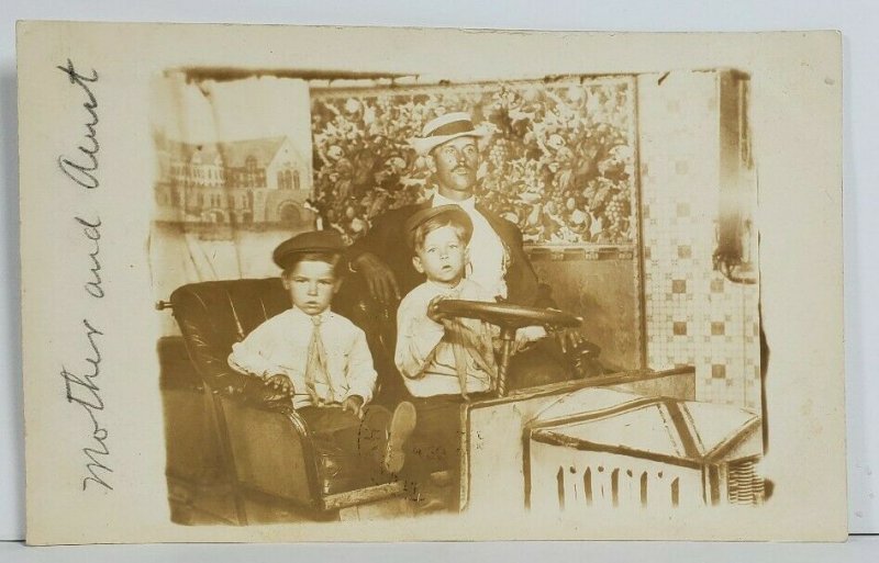 Rppc Darling Children in Faux Town Backdrop & Automobile Studio Postcard O16