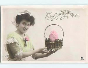 c1910 rppc foreign WOMAN HOLDS BIG PINK EGG IN EASTER BASKET HM0912