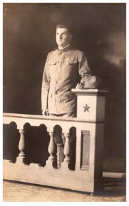 Soldier standing in Church  RPPC