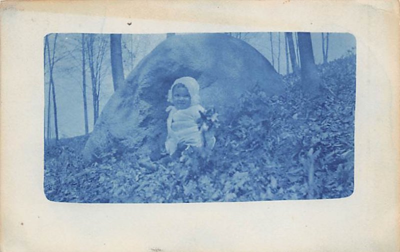 Baby in Leaves Blue Tinted 1911 