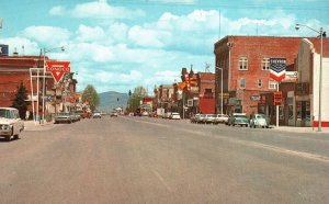 Postcard Main Street Deer Lodge Four Lane City Montana Chevron & Conoco Gas Stat