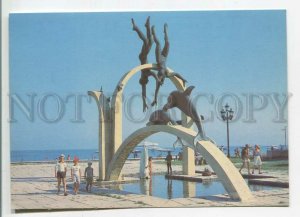 479340 USSR 1989 Abkhazia Pitsunda sculpture man and dolphin